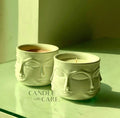 Visage Candle